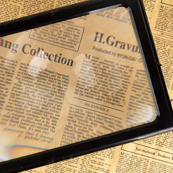 BOOKS MAGNIFYING GLASS / مكبرة القراءة