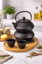 Cast iron teapot set (1.2L teapot, 4 cups, 1 teapot mat, 1 round stove) Black /طقم إبريق شاي من الحديد الزهر (إبريق سعة 1.2 لتر، 4 أكواب، حصيرة إبريق شاي، موقد دائري) أسود