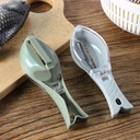 PRACTICAL FISH SCALE SCRAPER/أداة تقشير السمك