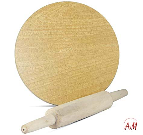 The rolling of wooden dough with a roll/فرادة العجين الخشبية مع رولة