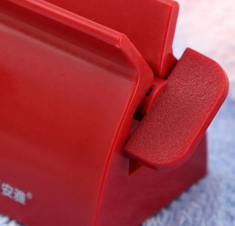 Toothpaste dispenser/عصارة معجون الاسنان