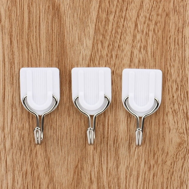 adhesive hook/علاقات لاصقة