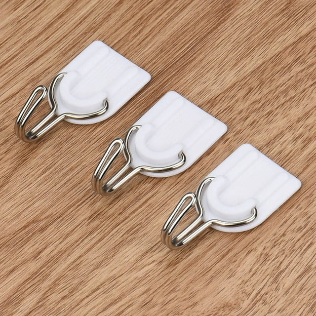 adhesive hook/علاقات لاصقة