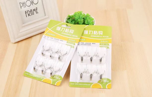adhesive hook/علاقات لاصقة